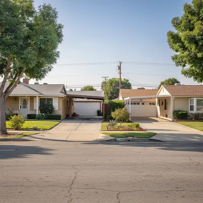 Postwar houses on a quiet block in Sunny Cove and Leland, Compton, California