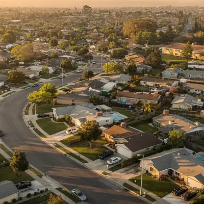 Aerial view of curving streets of 1950s tract homes in Lakewood, California