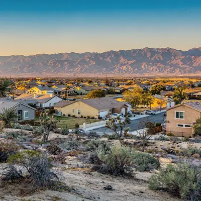 Joshua trees and high-desert neighborhoods below the San Gabriel foothills in Palmdale, California