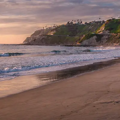 Torrance Beach at sunset with the Palos Verdes bluffs in Torrance, California
