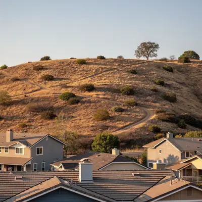 Homes backing onto open hillside in the Whittier Hills, Whittier, California
